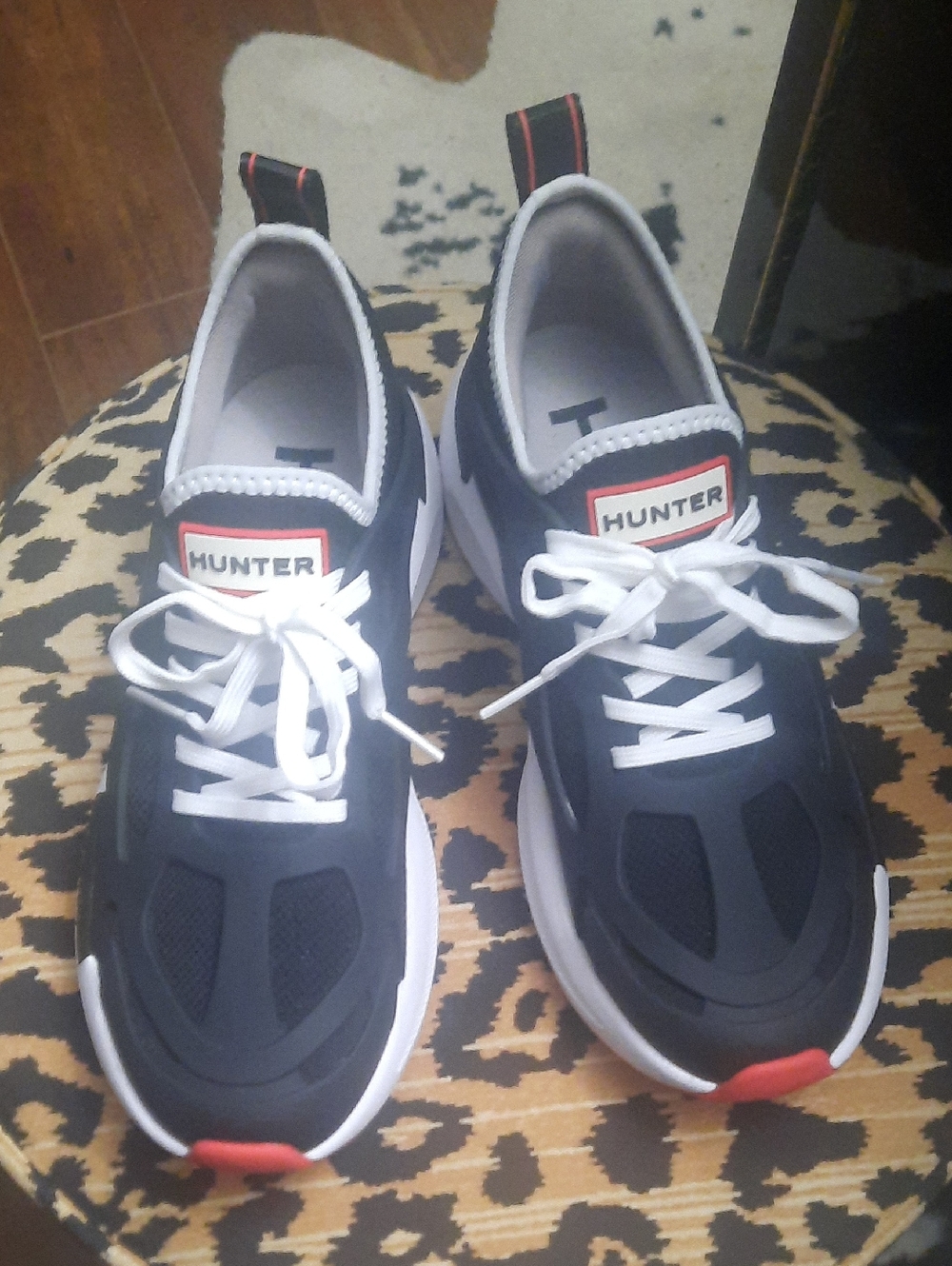 Hunter Black, White and Red Accent Sneakers